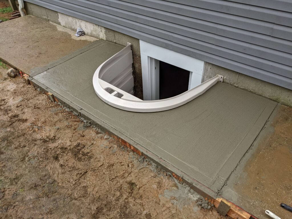 Completely Installed Basement Egress Window in Long Island Home