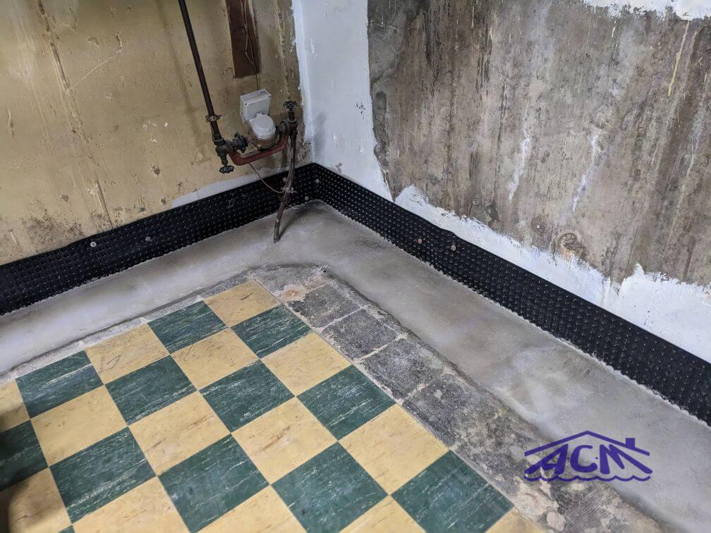 Long Island basement waterproofing professional completed french drain installation
