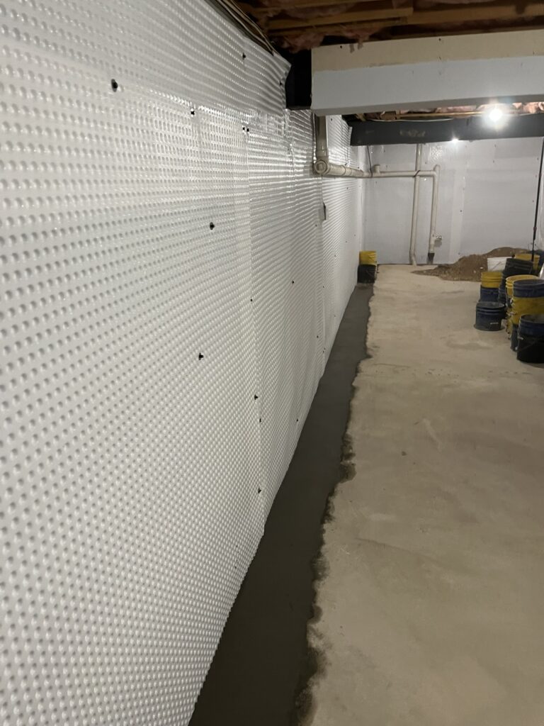 Covered french drain system in Long Island