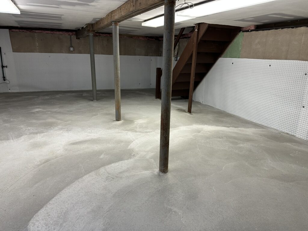 Completed basement waterproofing project in Long Island