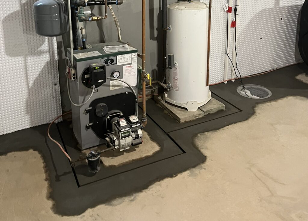Long Island Basement Waterproofing around basement utilities
