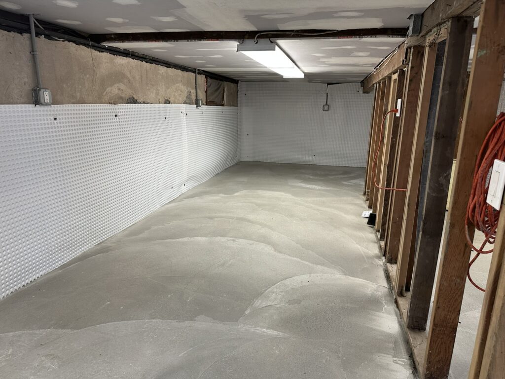 Completed basement waterproofing in Long Island