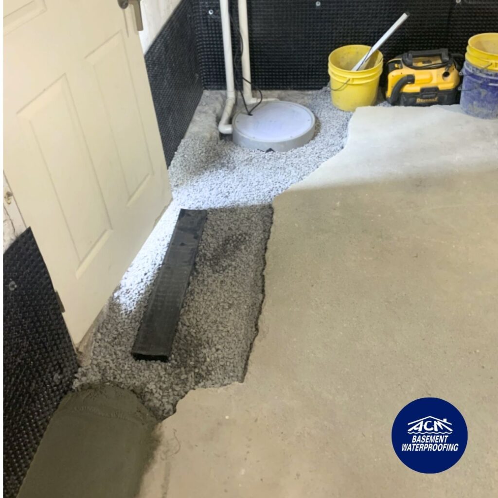 Interior french drain with a sump pump as part of waterprofoing in a basement
