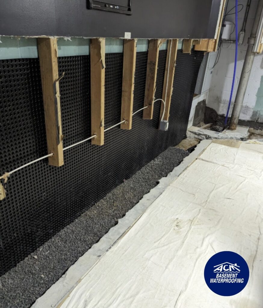 removing drywall for a perimeter french drain for Long Island basement waterproofing